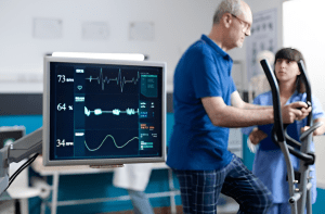 close-up-heart-rate-monitor-measuring-heartbeat-patient-doing-gymnastics-physical-recovery-retired-man-using-sport-equipment-exercise-physiotherapy-strength